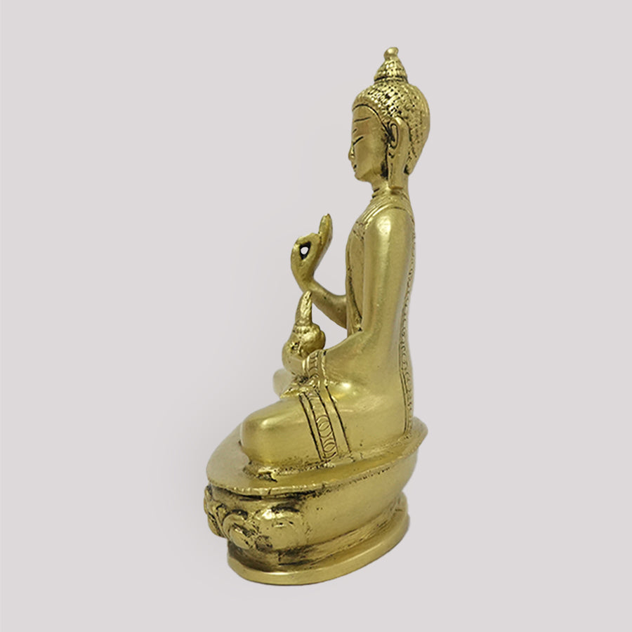 BRASS MEDITATING BUDDHA ON OVAL BASE