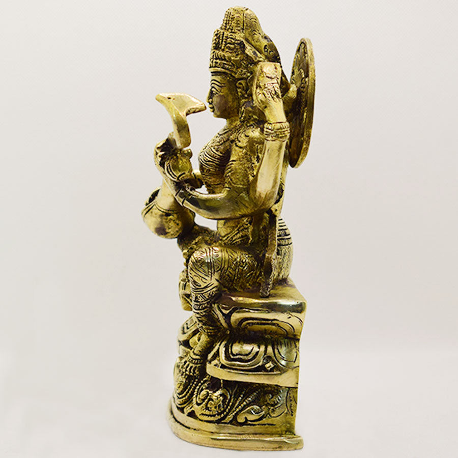 BRASS SARAWATI SITTING WITH FLOWER BASE