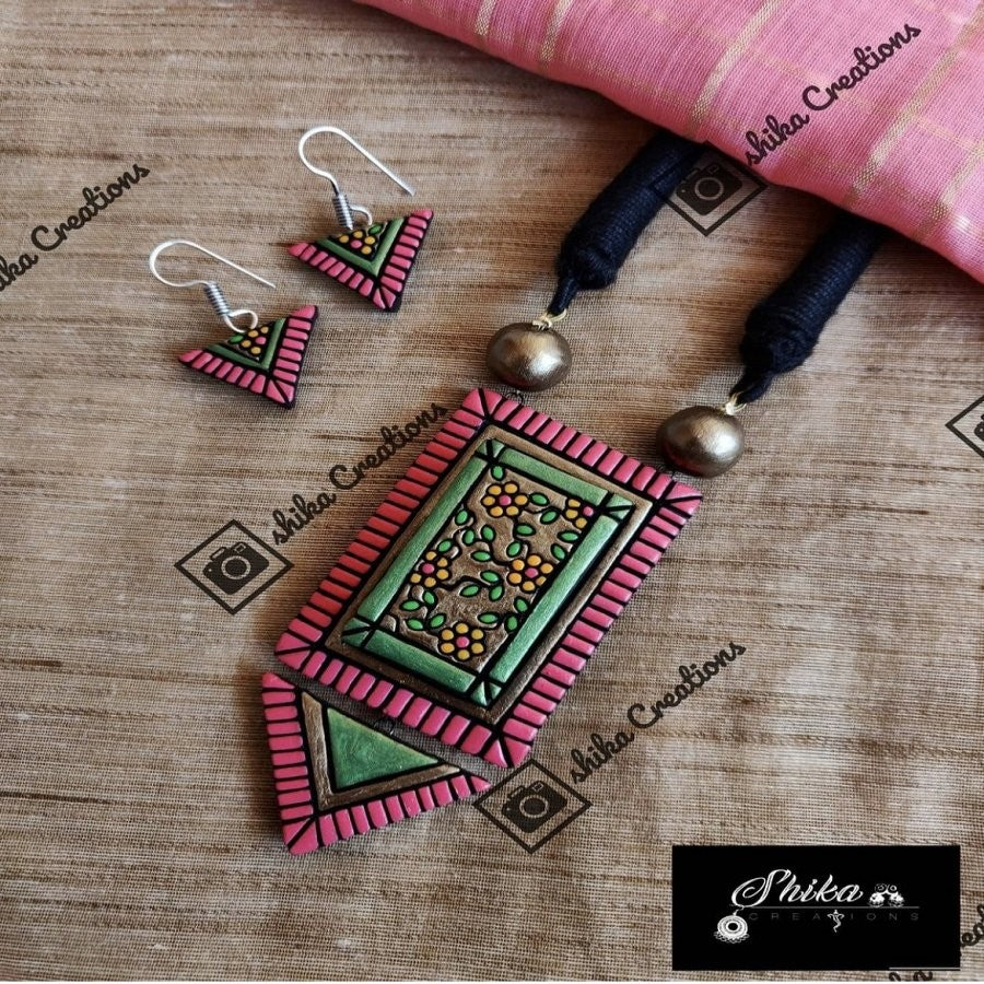 TERRACOTTA REGULAR WEAR NECKSET WITH DANGLERS. COLOURS: PINK,GREEN,YELLOW AND ANTIQUE BRONZE.