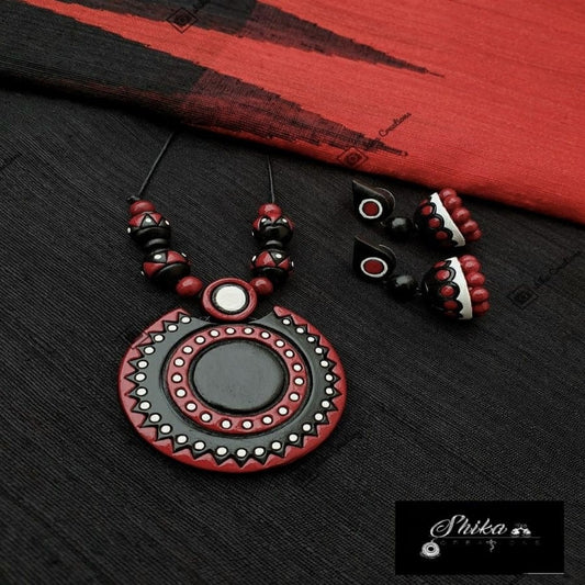 TERRACOTTA REGULAR WEAR NECKSET WITH JHUMKAS. COLOURS: BLACK, WHITE AND RED.