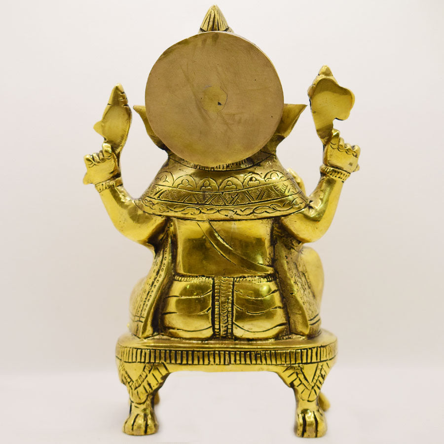 TRADITIONAL BRASS GANESHA SITTING ON LION FEET STAND